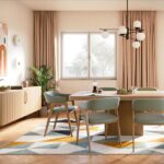 Una sala da pranzo dotata di serramenti in alluminio che la rendono super luminosa